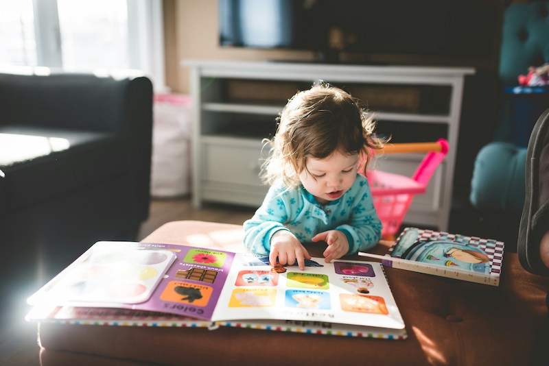 Kid reading a book